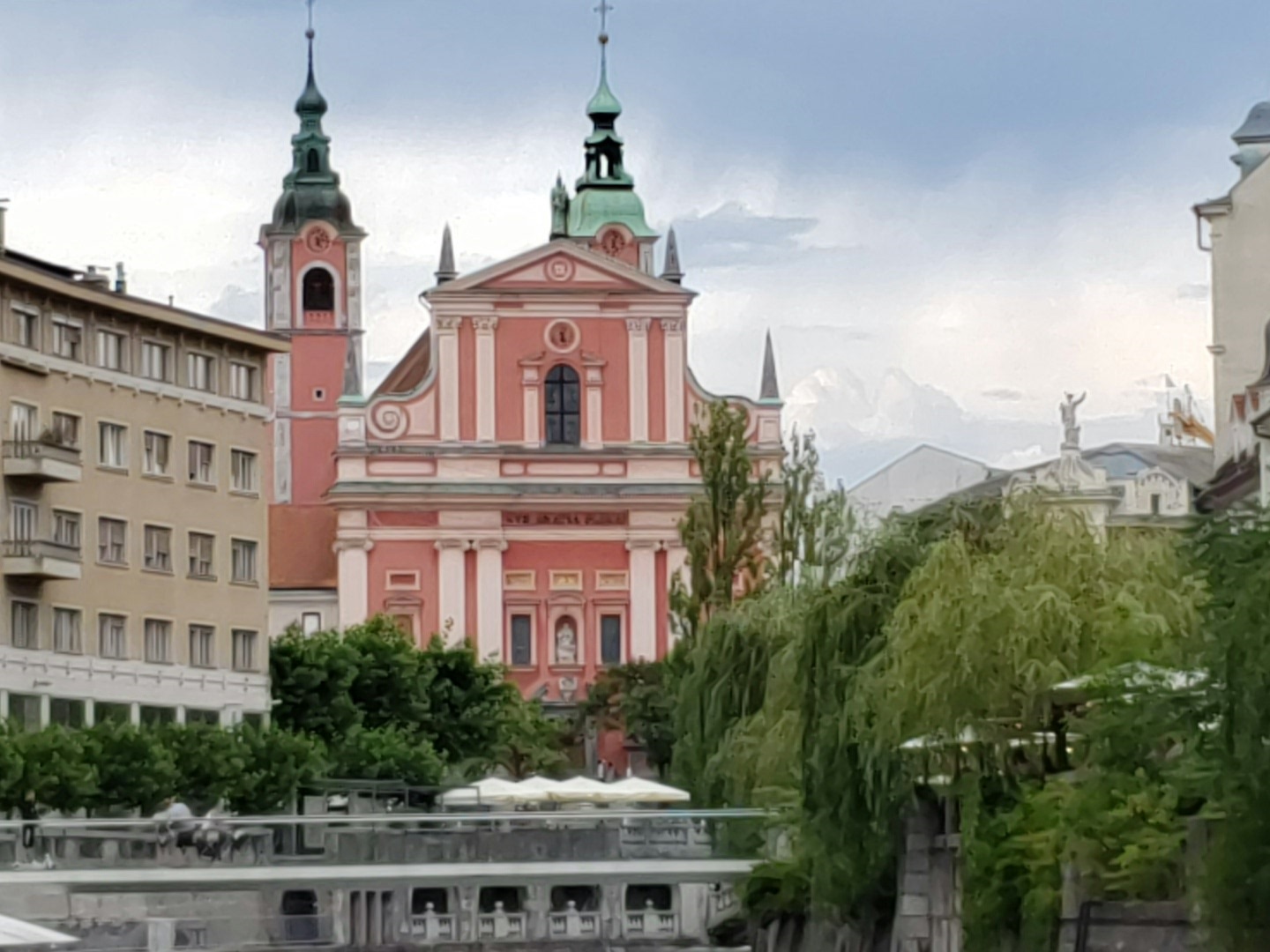 view from the boat of a pink church