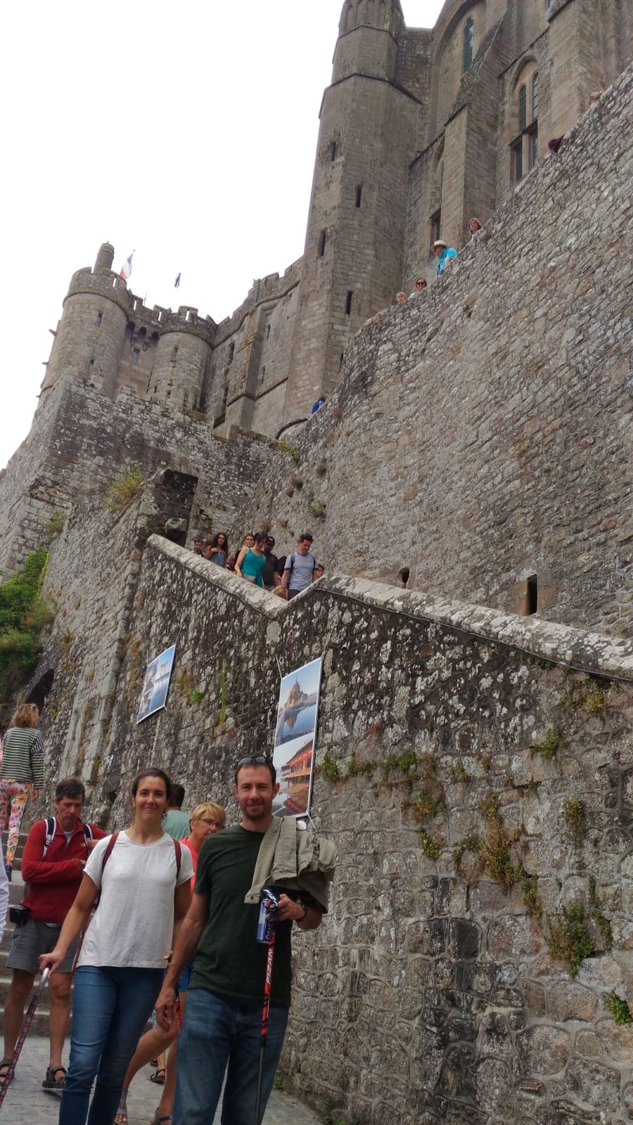 Kerry and Patrick walking along the walls.