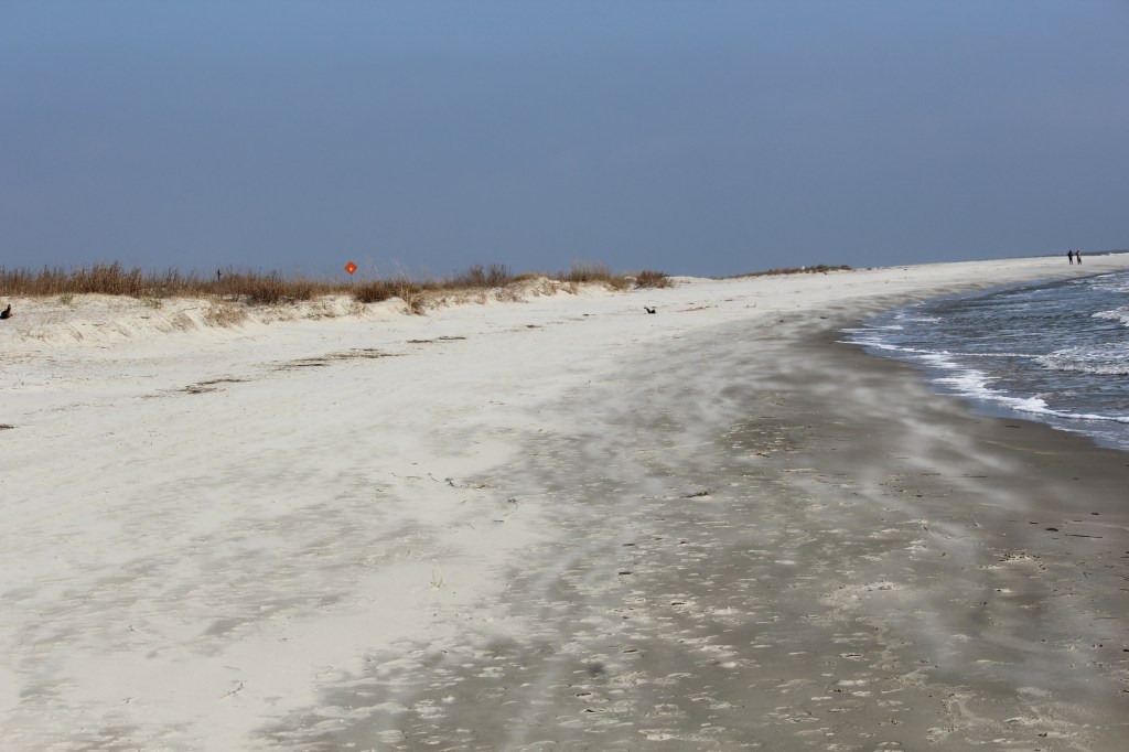 Basic photo of a beach, mostly sand.
